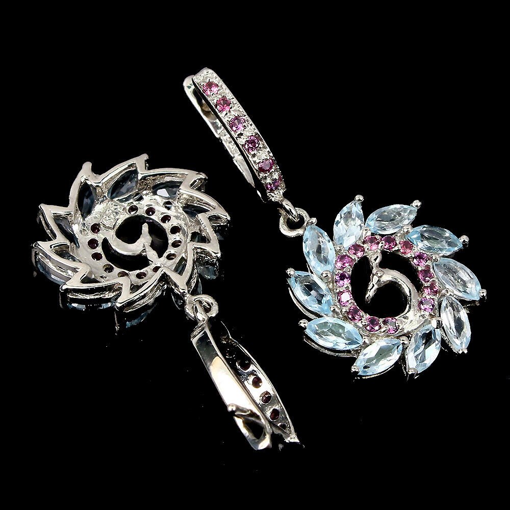 Blautopas Sky Blue Rhodolit Pfau Ohrringe aus weißvergoldetem Silber - INARA