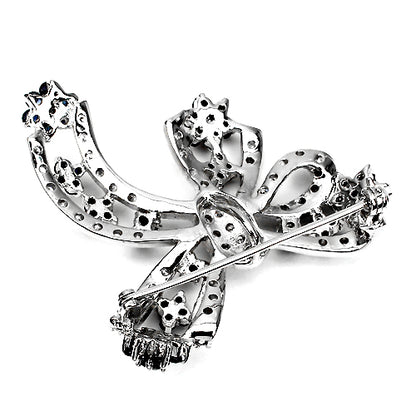 Saphir Schleife Brosche aus weißvergoldetem Silber