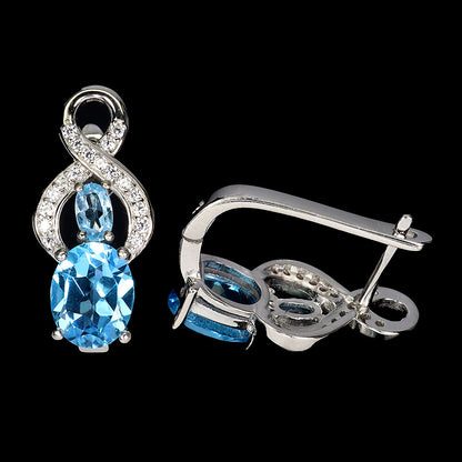 Swiss Blautopas Ohrringe aus weißvergoldetem Silber - INARA